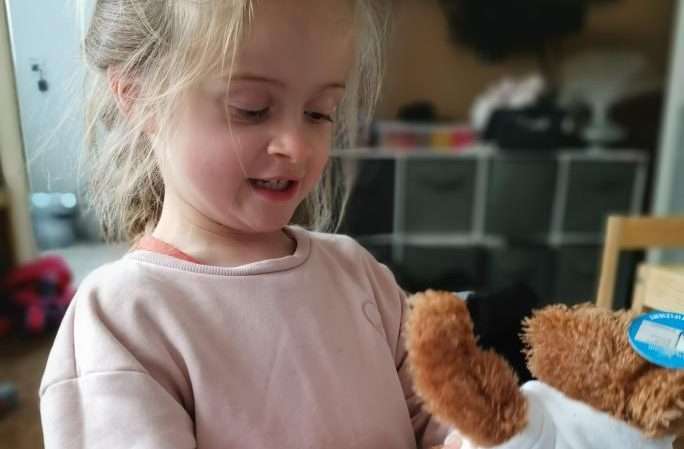Girl holding a bear